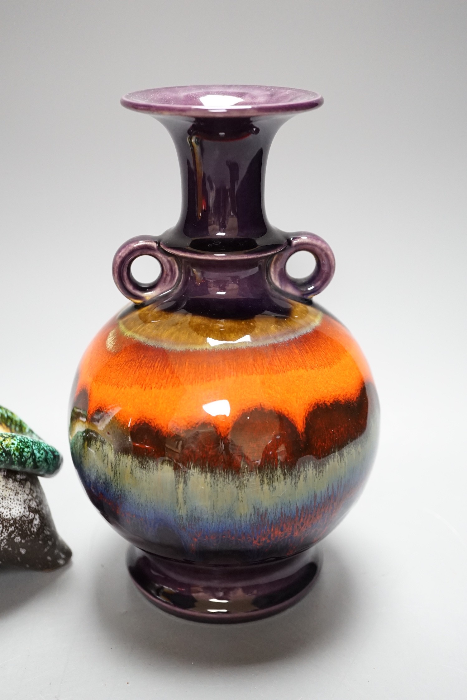 A Copenhagen porcelain seal, a Canadian pottery bull and two German vases tallest 21.5cm